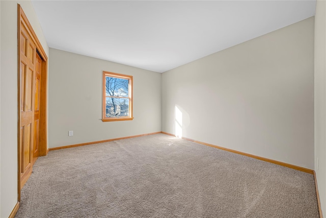 view of carpeted spare room