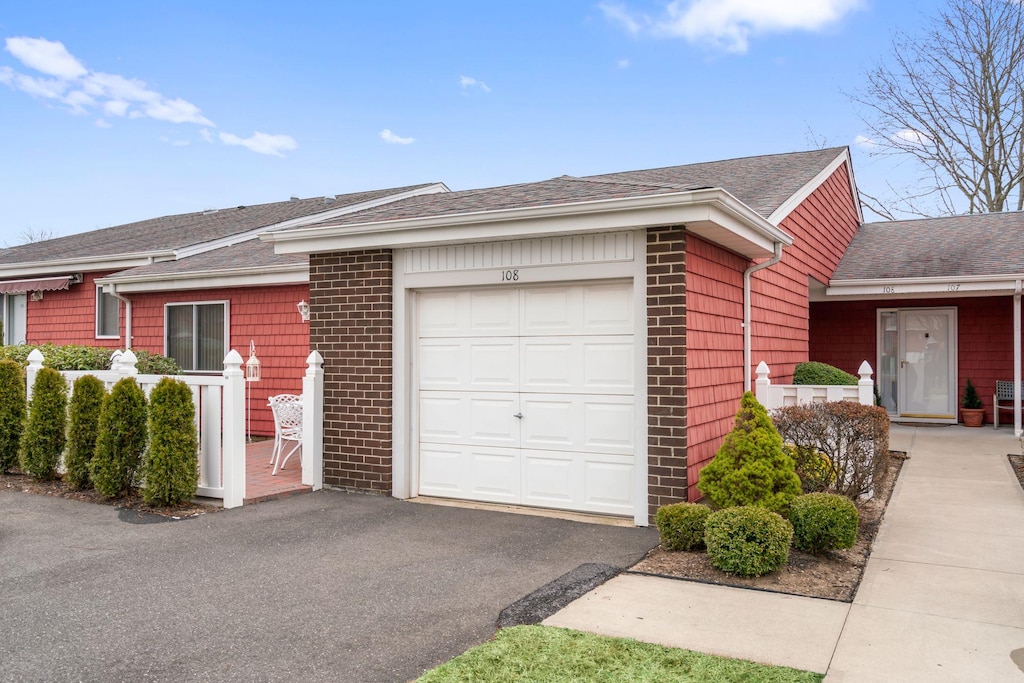 exterior space with a garage