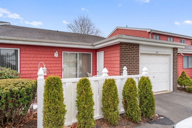 exterior space with a garage