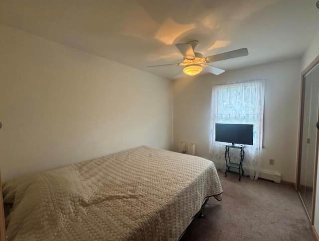 bedroom with carpet flooring, ceiling fan, and a baseboard heating unit