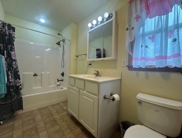 full bathroom featuring vanity, toilet, and shower / bathtub combination with curtain