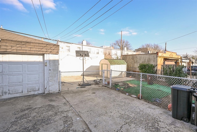 view of patio / terrace with a storage unit