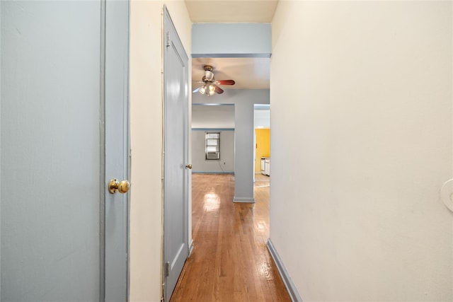 hall with light hardwood / wood-style flooring