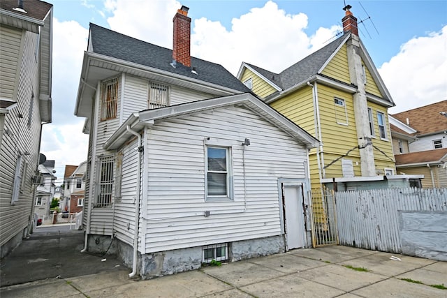 rear view of house with a patio