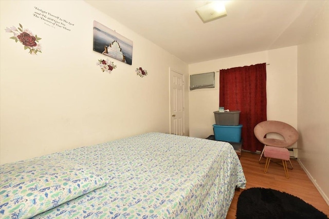 bedroom featuring hardwood / wood-style floors