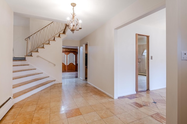 entryway featuring light tile patterned floors, a baseboard radiator, and a notable chandelier