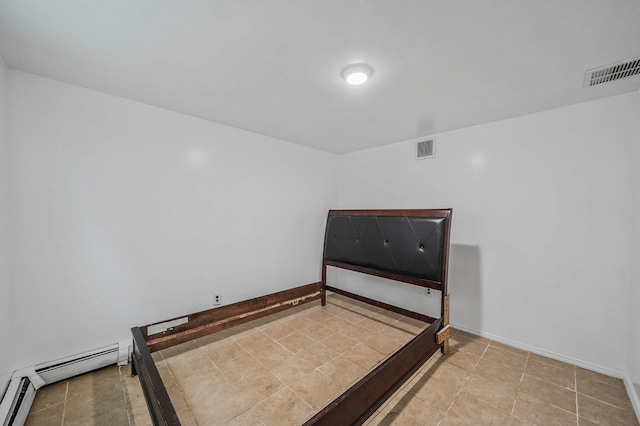 bedroom featuring a baseboard radiator