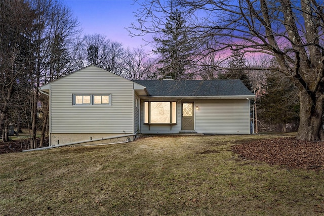 view of front of home featuring a yard