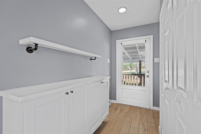 doorway featuring light wood-type flooring