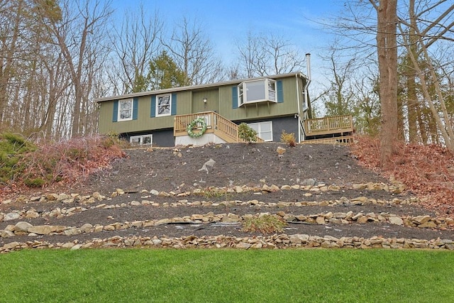 view of front of house featuring a deck