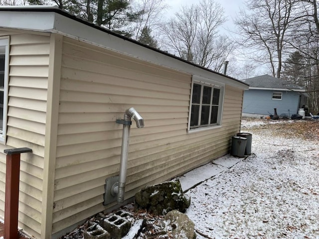 view of snow covered property