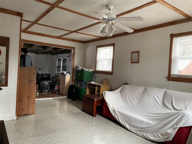 bedroom with multiple windows and ceiling fan