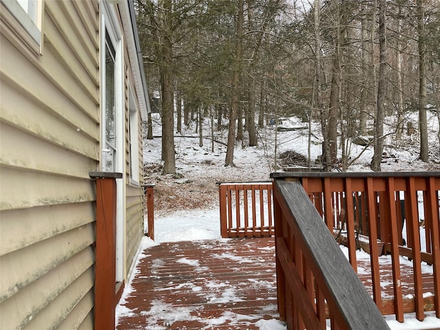 view of snow covered deck