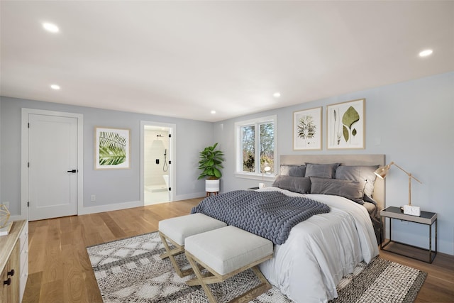 bedroom with recessed lighting, baseboards, and wood finished floors