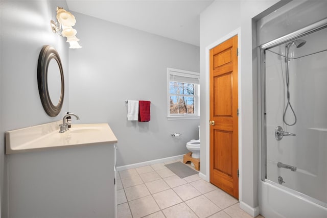 full bathroom with enclosed tub / shower combo, tile patterned flooring, vanity, and toilet