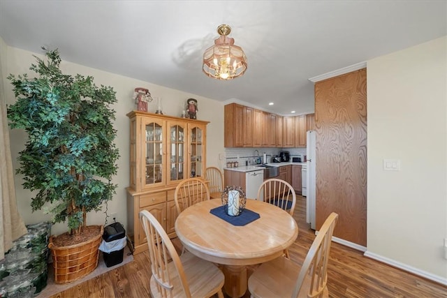 dining area featuring hardwood / wood-style floors