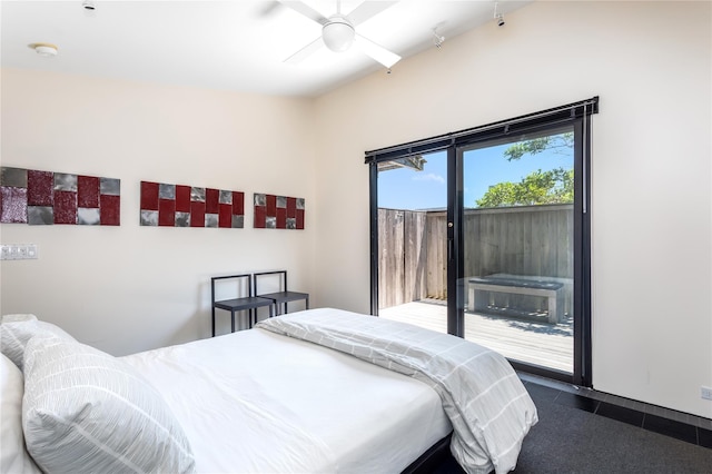 bedroom featuring ceiling fan and access to outside