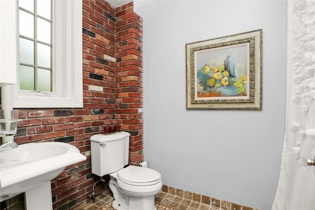 bathroom with sink and toilet