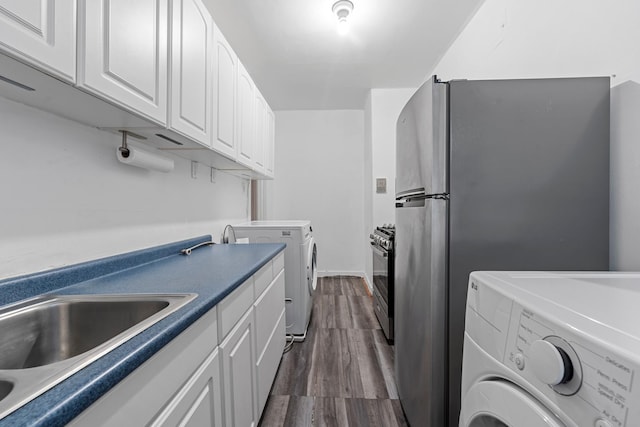 washroom featuring dark hardwood / wood-style flooring and sink