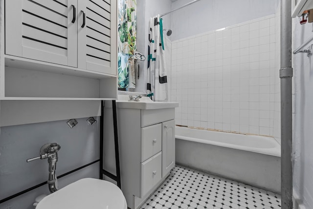 full bathroom featuring vanity, toilet, and shower / bathtub combination with curtain