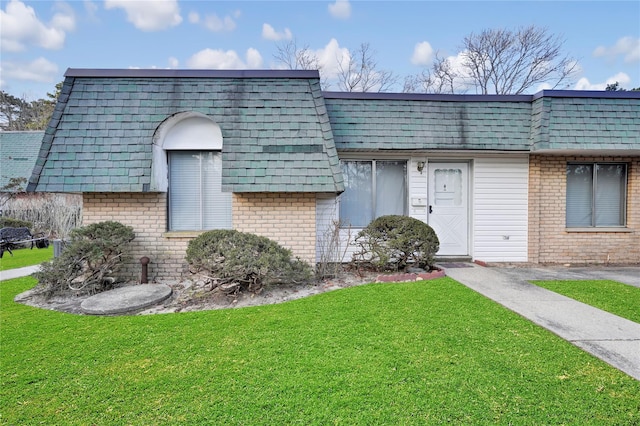 view of front of home with a front yard