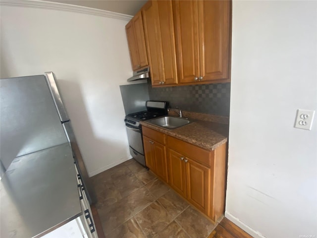 kitchen featuring sink, decorative backsplash, ornamental molding, and stainless steel appliances