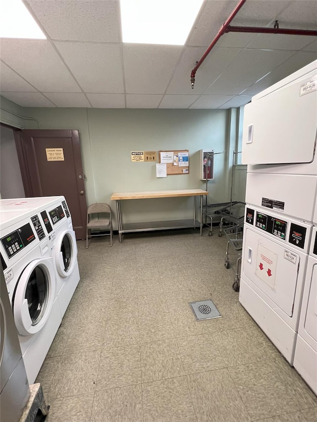 washroom featuring stacked washer and clothes dryer and independent washer and dryer