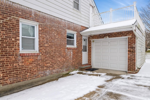 view of snow covered garage