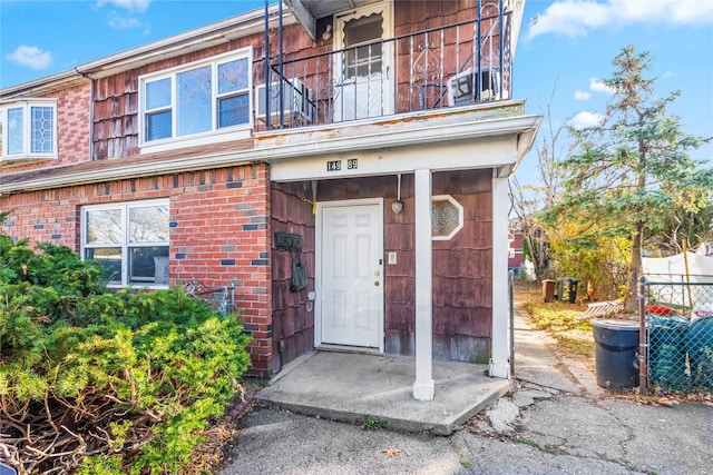 doorway to property featuring a balcony