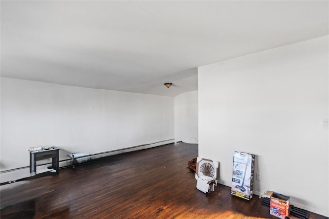 unfurnished room featuring dark hardwood / wood-style flooring