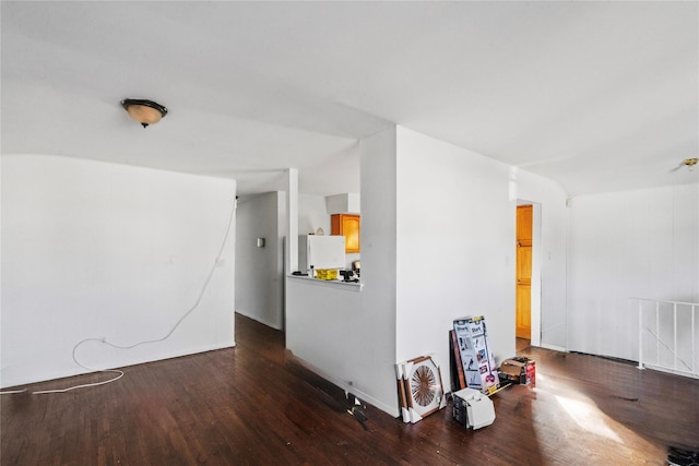 empty room with hardwood / wood-style floors