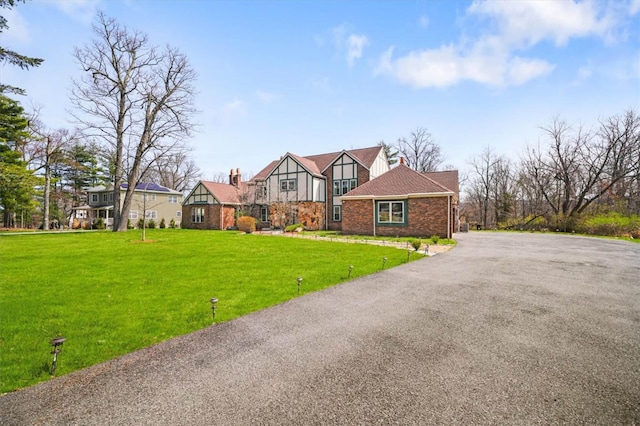 view of front of property with a front lawn