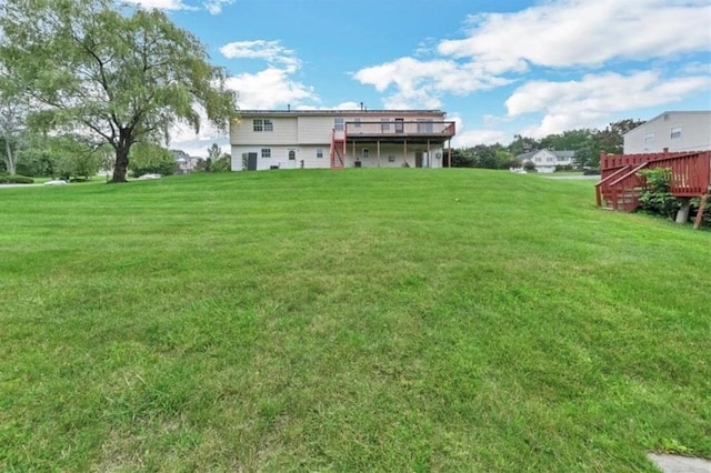 view of yard featuring a deck