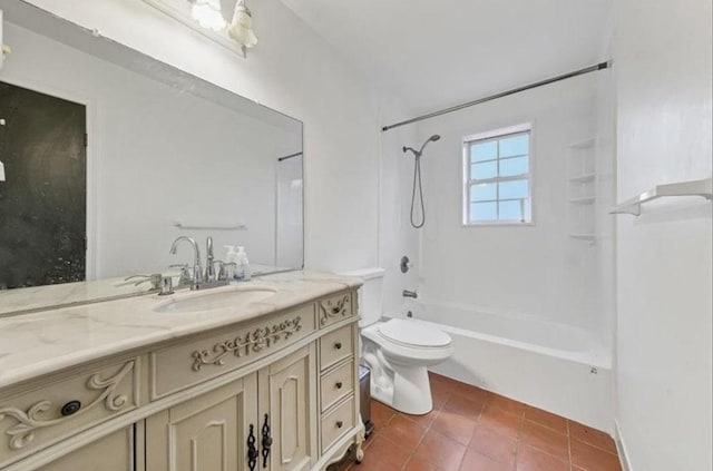 full bathroom featuring tile patterned flooring, vanity, toilet, and washtub / shower combination