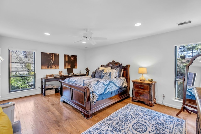 bedroom featuring ceiling fan and hardwood / wood-style floors