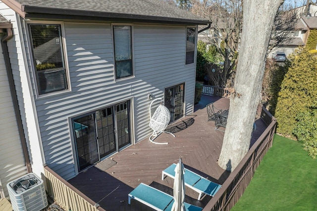 wooden deck featuring cooling unit