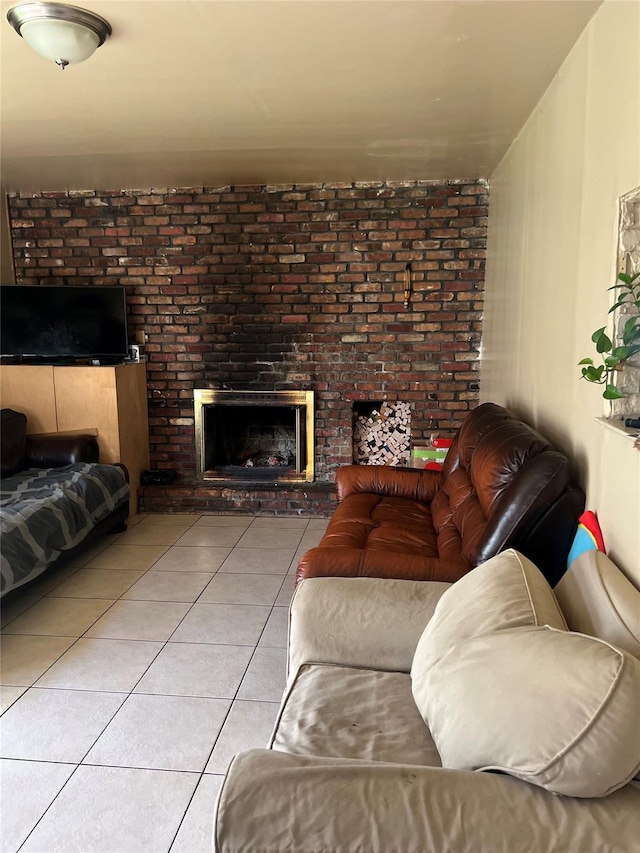 tiled living room featuring a fireplace