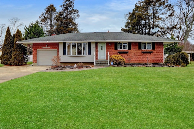 ranch-style home featuring a front lawn and a garage