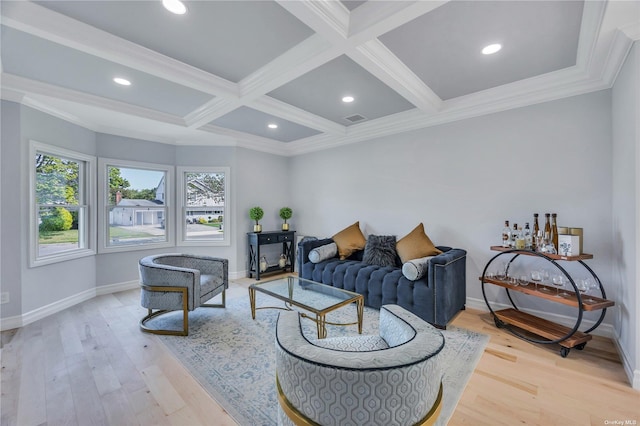 living room with beamed ceiling, light hardwood / wood-style floors, crown molding, and coffered ceiling