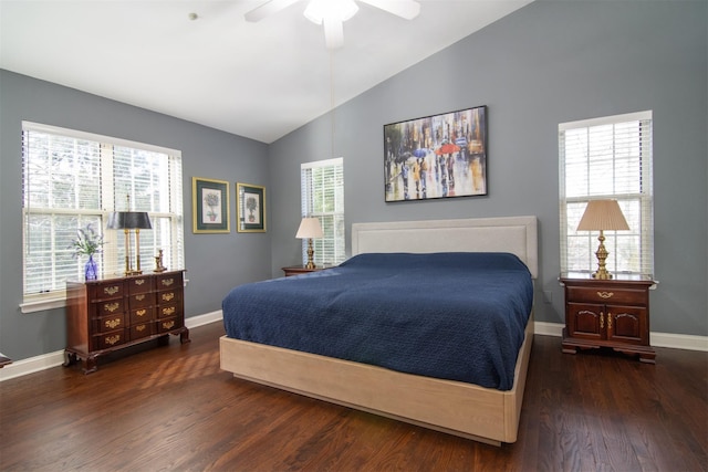 bedroom with lofted ceiling, dark wood-type flooring, and ceiling fan