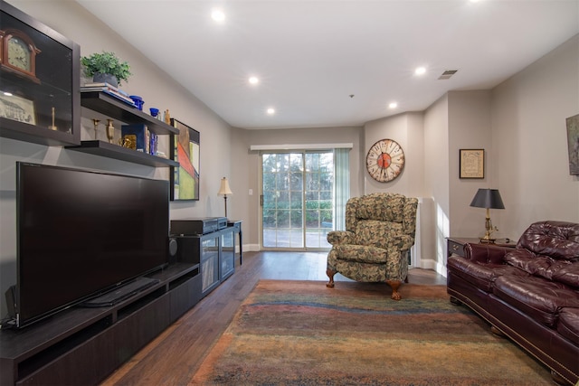 living room featuring dark hardwood / wood-style floors