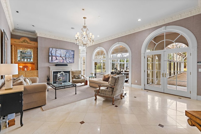 tiled living room with a notable chandelier and french doors