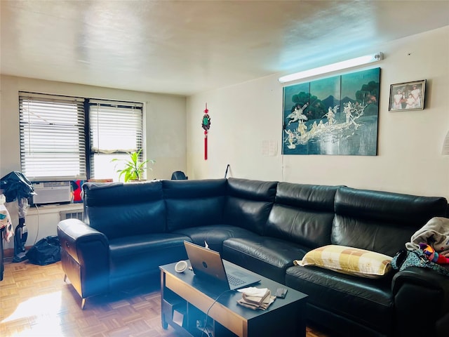 living room featuring parquet flooring and cooling unit