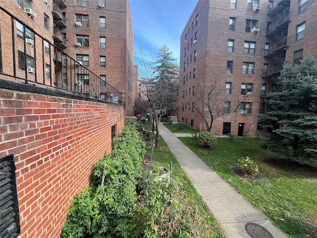 view of community featuring a yard