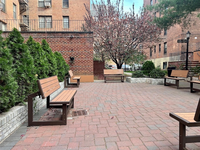 view of property's community with a patio area
