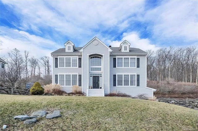 view of front of home featuring a front lawn