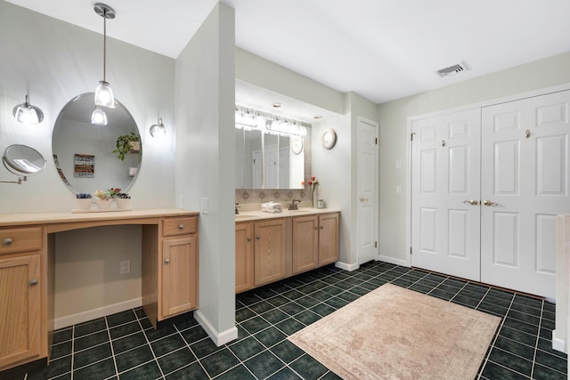 bathroom with vanity