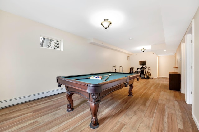 playroom featuring baseboard heating, light wood-type flooring, and billiards