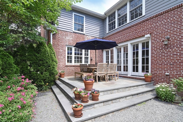 wooden deck featuring a patio