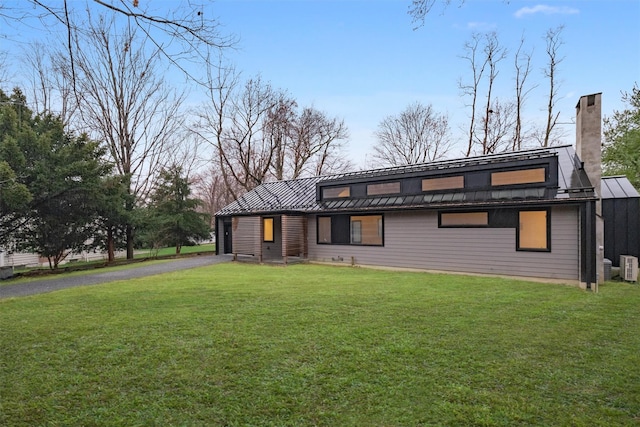 view of front of home with a front yard